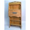 Image 1 : An Arts and Crafts oak students desk, with open shelves and fall front applied with a copper pane...