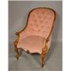 Image 1 : A Victorian walnut buttonback armchair, with pink dralon upholstery and moulded frame, on cabriol...