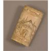 Image 1 : A 19th Century bone scrimshaw, engraved with a sailing ship, Eastern buildings and a sailor holdi...