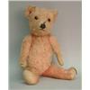 Image 1 : A Chad Valley pink plush teddy bear, circa 1939....