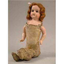 An Armand Marseille bisque head doll, with sleep eyes, pierced mouth and kid body, no.370, 16 ins...