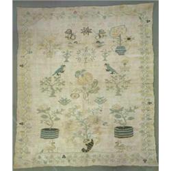 A George lll needlework sampler, with butterflies, cherubs , birds and plants, dated 1815 and ini...