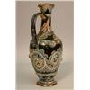 Image 1 : A Doulton Lambeth ewer by George Tinworth, incised with a continuous design of leaf-scrolls and a...