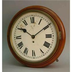 A Victorian mahogany dial clock, with 11in. enamelled dial and timepiece fusee movement....