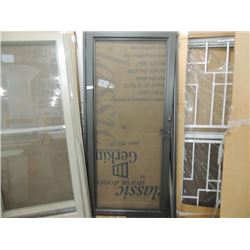 BRAND NEW STORM DOOR WITH HARDWARE $450