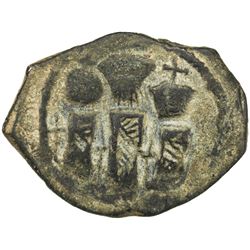 ARAB-BYZANTINE: Three Standing Figures, ca. 650-680, AE fals (5.44g), year "17". VF