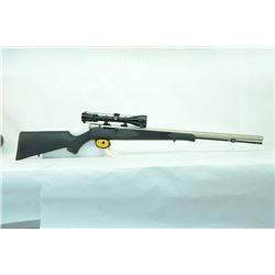 TRADITIONS TRACKER RIFLE