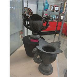 Pair of heavy bronze urns