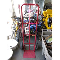 Red metal dolly - used