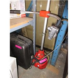 Shindawa gas powered trimmer with brush blade