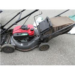 Honda gas powered lawnmower with bag attachment