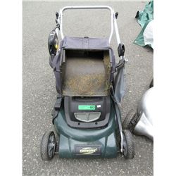 Yard Works cordless lawnmower with bag attachment