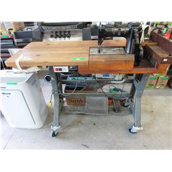 Vintage Industrial treadle sewing machine on bench