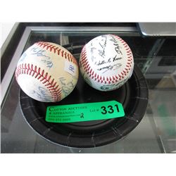 2 Autographed team baseballs