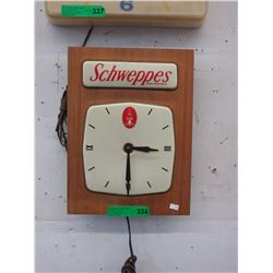 Schweppes electric wall clock - used