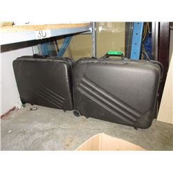 2 Hard side suitcases - used