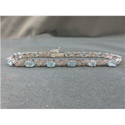 Blue Topaz & Diamond Tennis Bracelet