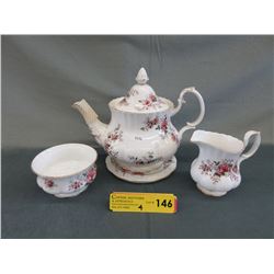 Royal Albert tea pot, drip plate, creamer & sugar
