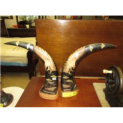 Pair of carved wood decorations