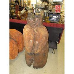 Carved solid wood bear statue