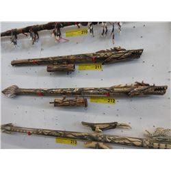 Carved bone blow gun