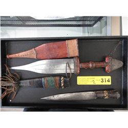 2 Daggers with leather sheaths