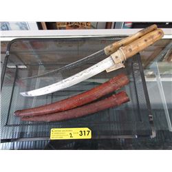 2 Afghan daggers with leather sheaths