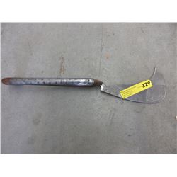 Wood handled knife with curved blade
