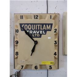 "Coquitlam Travel Ltd." advertising wall clock