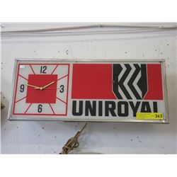 Vintage - "Uniroyal" electric & battery wall clock