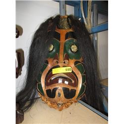 Carved cedar West Coast mask