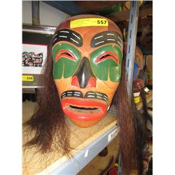 Carved cedar mask with horse hair