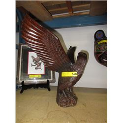Solid carved wood eagle statue