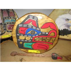 First Nations hide drum with carved stick