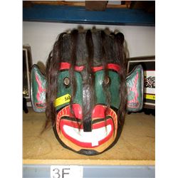 Carved cedar Haida mask by Gary Neasloos
