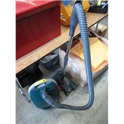 Cannister vacuum with rug attachment - used