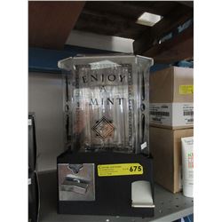 Coin operated candy machine - used