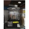 Image 1 : Coin operated candy machine - used