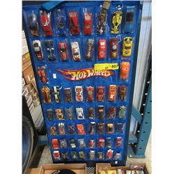 Hot Wheels display containing 58 cars