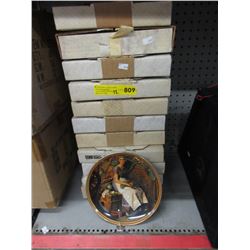 12 Collector plates with original boxes.