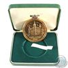 Image 1 : 1973 HM Royal Palace and Fortress of the Tower of London gold coloured Medallion in green leatherett
