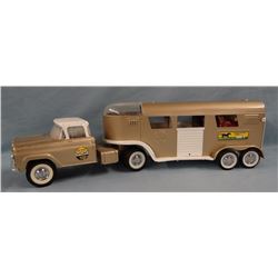 Toys: Nylint truck & horse trailer; Mojorette rodeo trailer; Spinning top