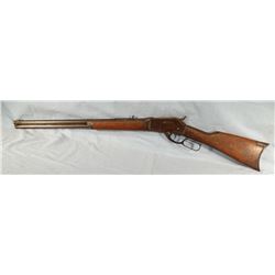Marlin 1881, .38-55, 23" bbl, s# 14611, crack in foregrip, dust cover missing. Made 1886.