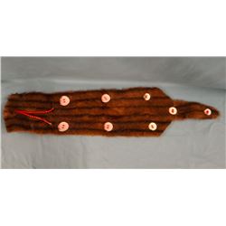 Mink fur, decorated w/8 round plastic pendant shell "spots" and red pony beads, part of contemporary