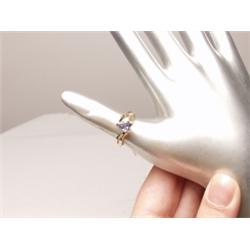 Fine Tanzanite & Diamond Ring