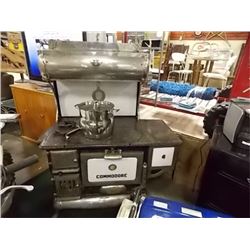 VINTAGE COMMODORE WOOD STOVE - 6 BURNER - WATER BOILER ON SIDE - HAS ALL BURNERS - 24" X 49 X 60" TA