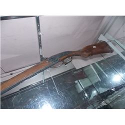 BLACK POWDER RIFLE WITH FILLED SOLID BARREL - BARREL TWISTS TO ALLOW FOR FIRING BOTH BARRELS - IF IT