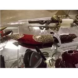KNIFE - CURVED BLADE WITH RED VELVET COVERED SHEATH