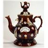 Image 1 : Large brown glazed bargeware teapot and cover on stand relief moulded with leaves and berries and pe