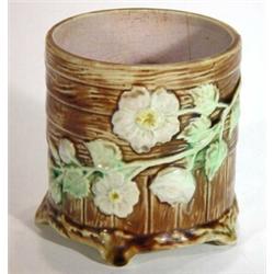 Victorian Majolica pot, relief moulded with sprigs of flowers and leaves onto a slatted wooden groun